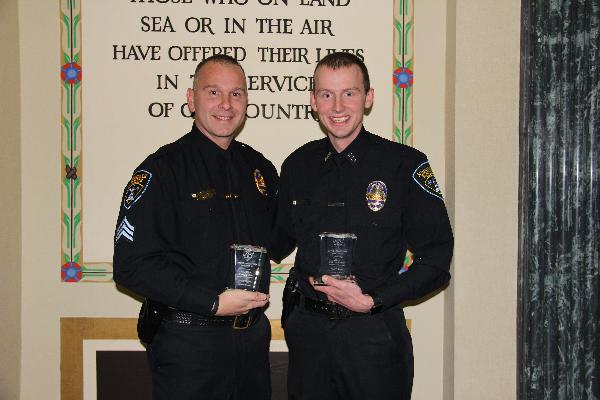 Sergeant Mark Wodka (left) and Police Officer Carter Sward are credited with saving a person’s life at the Hinsdale Oasis in October 2016.